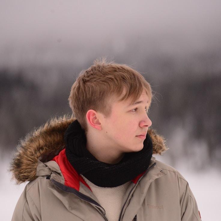 Kaveri Mehta, Lead Design Curator at HollowPulseNook, reviewing corporate floral arrangements